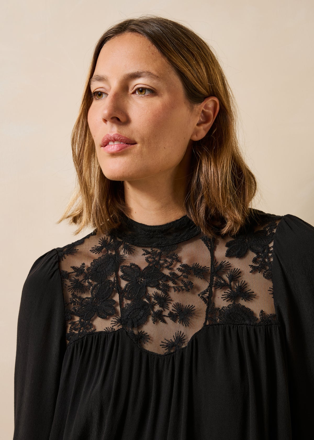 Black long-sleeve top with lace