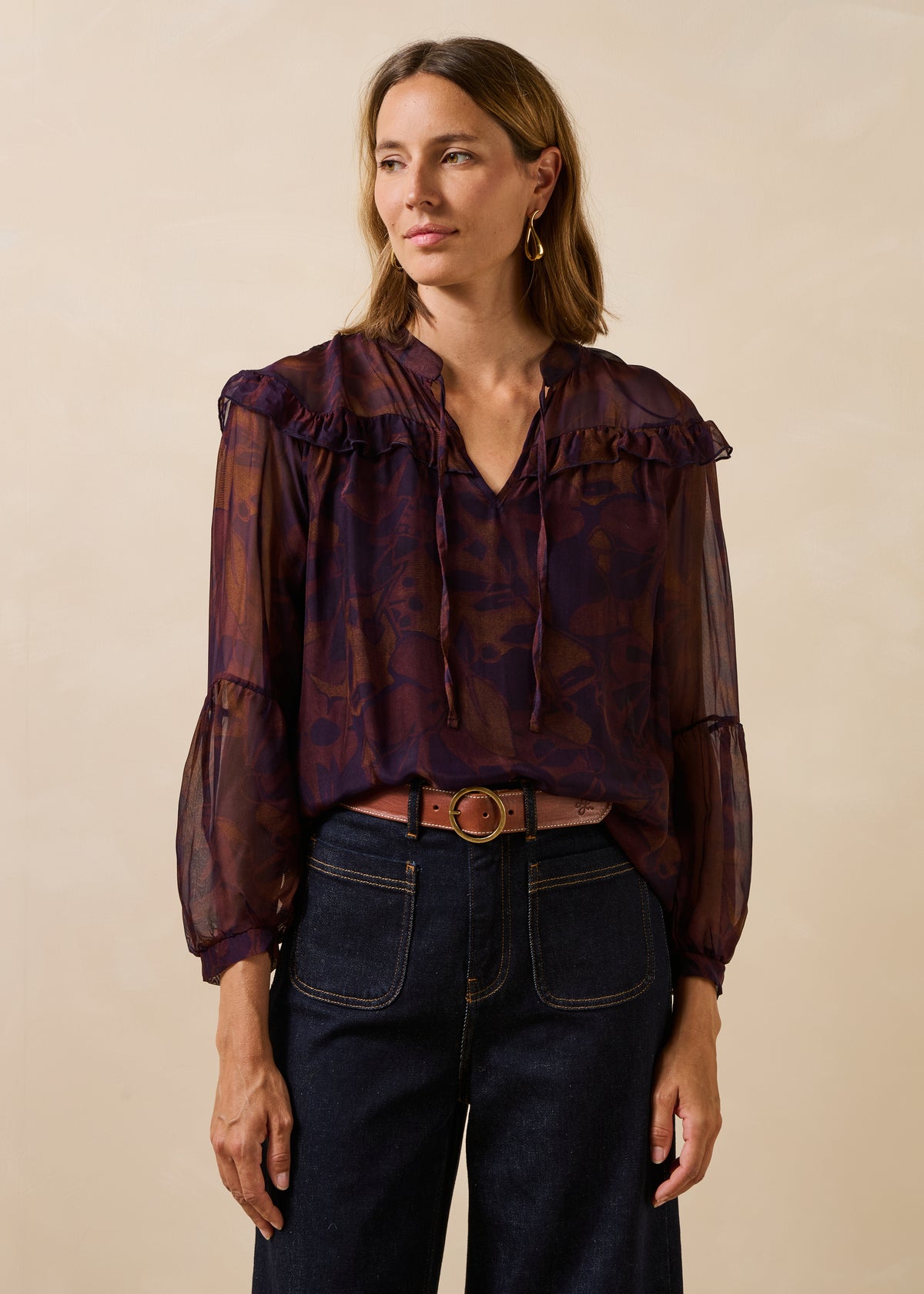 Violet long-sleeve top with floral print